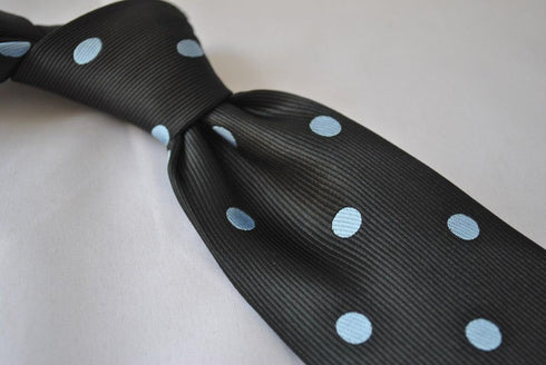 black tie with light blue polka dots